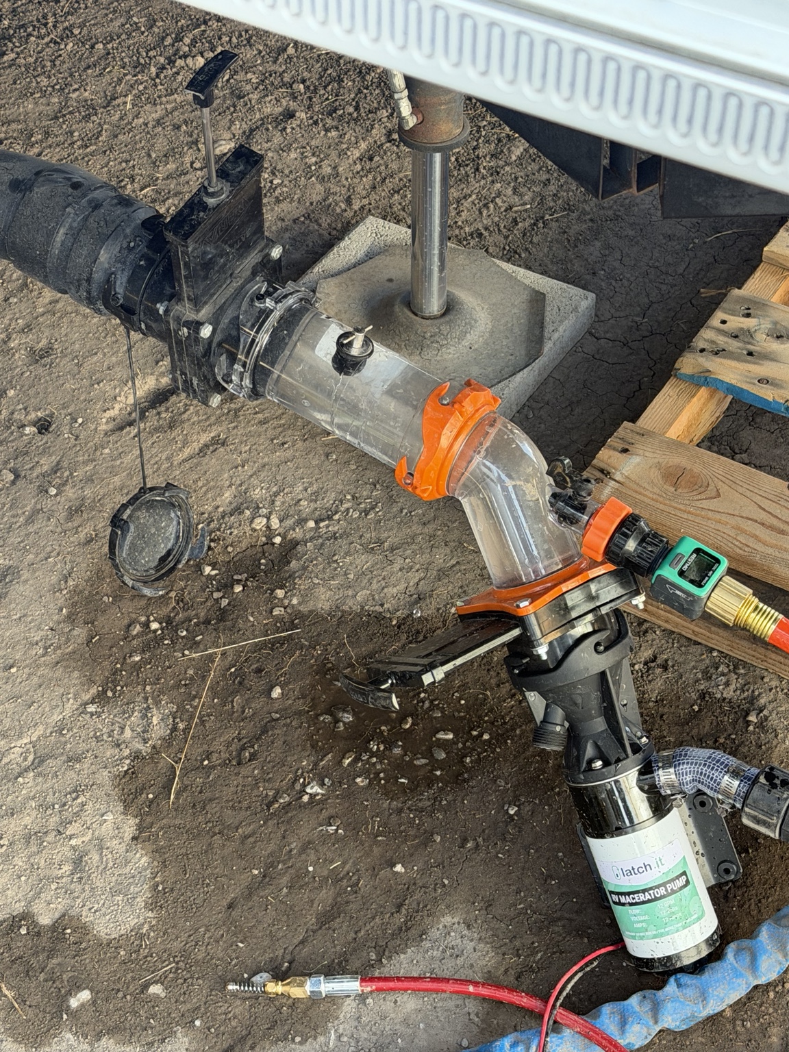 Clear RV waste fitting used during tank cleaning